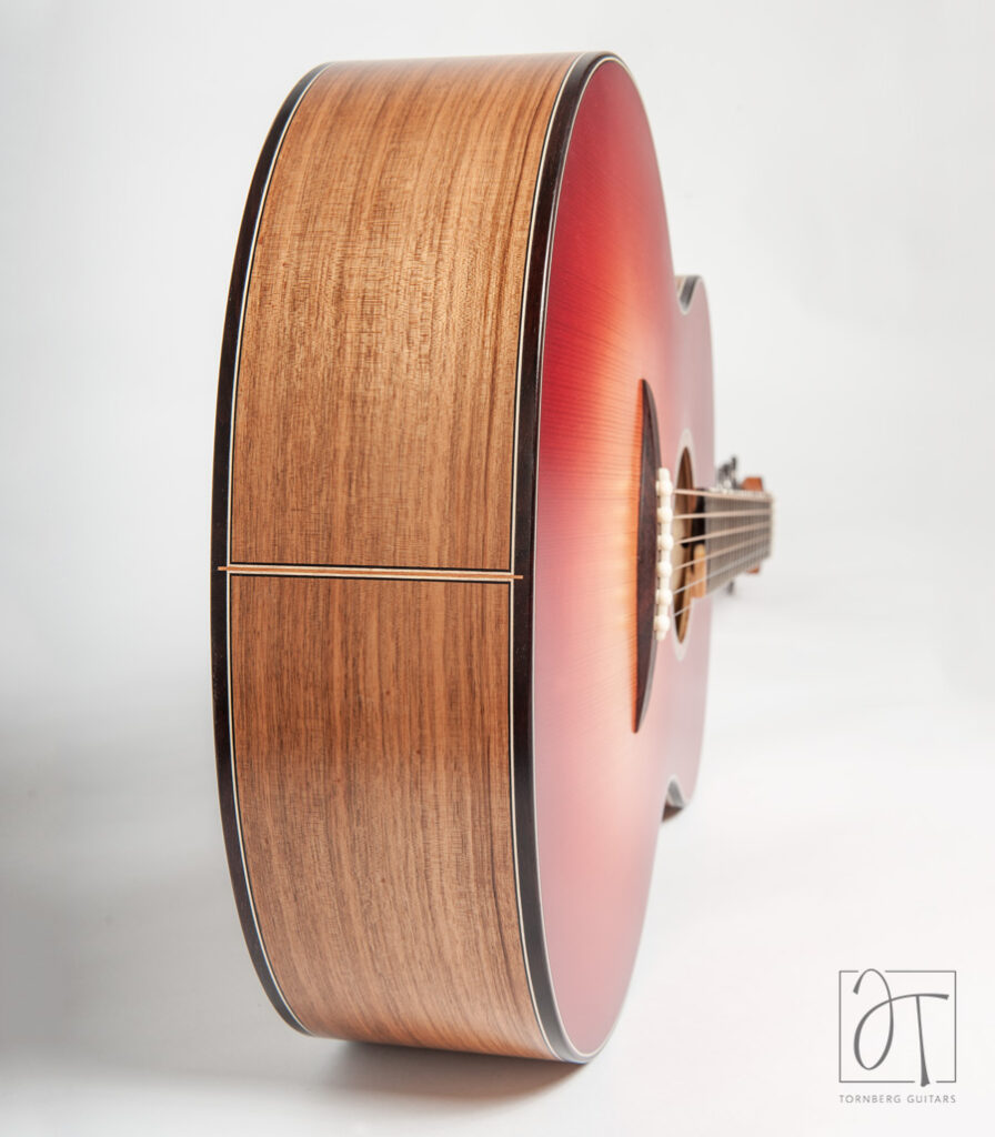 Walnut back and sides dreadnought size guitar